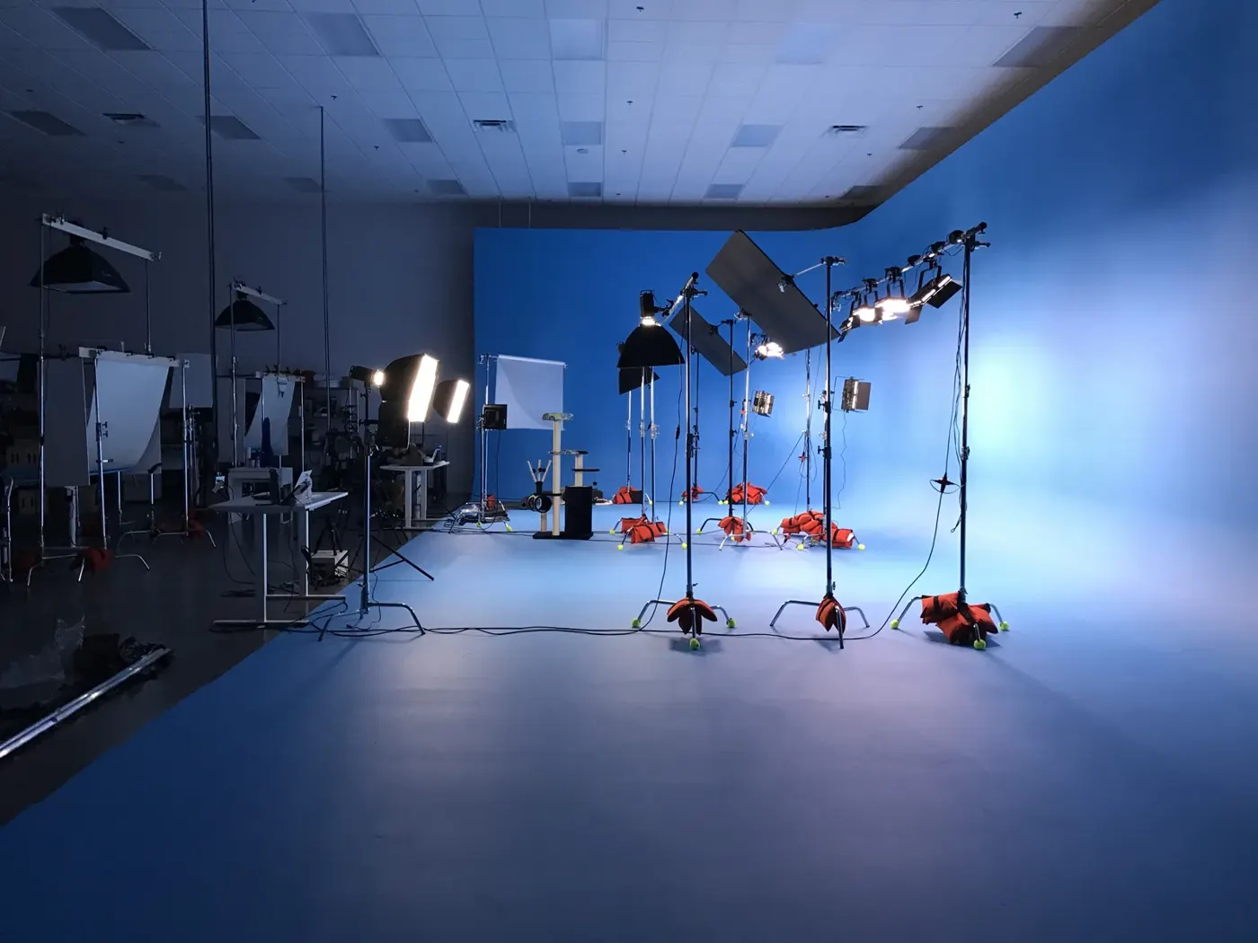 Lighting set up on a blue cyc studio wall